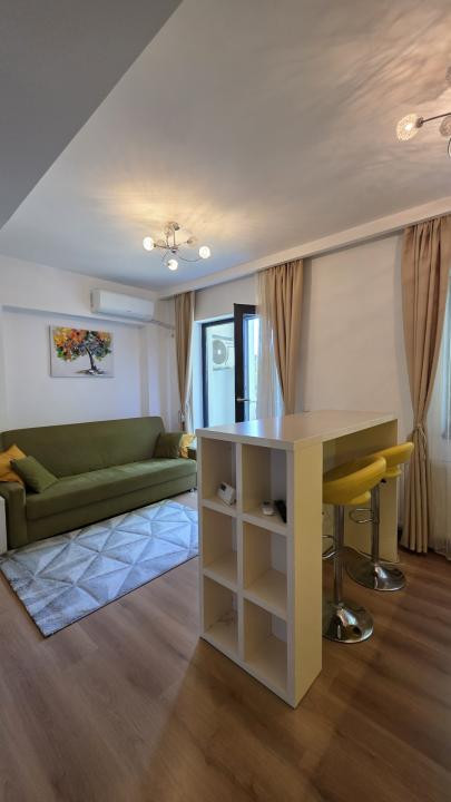 Inchiriere 2 camere-  parcare subterna si centrala proprie